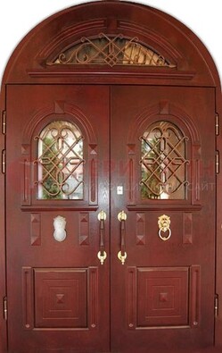 Стальная арочная дверь со стеклом и ковкой ДА-30 в дом из кирпича в Пушкино