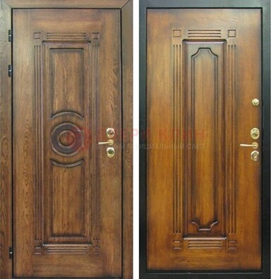 Коричневая металлическая дверь с массивом дуба с рисунком ДМД-10 в Пушкино