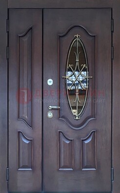 Темная металлическая дверь Винорит со стеклом и ковкой ДСК-239 в Пушкино