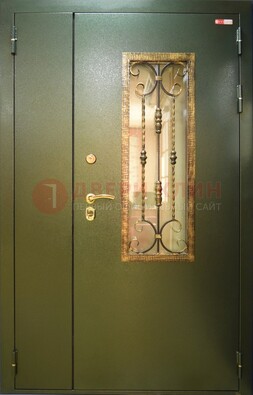 Стальная дверь со стеклом и ковкой ДСК-29 для квартиры в Пушкино