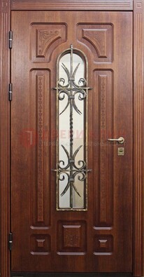 Тяжелая стальная дверь со стеклом и ковкой ДСК-42 в Пушкино